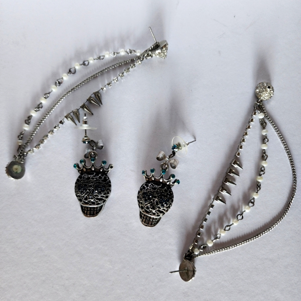 Skull Earrings with dangle looped earrings.